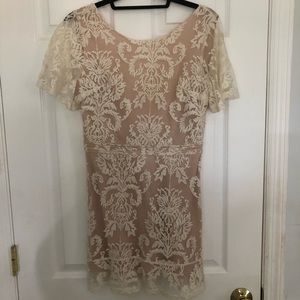 White and Nude Luxxel dress with plunging back